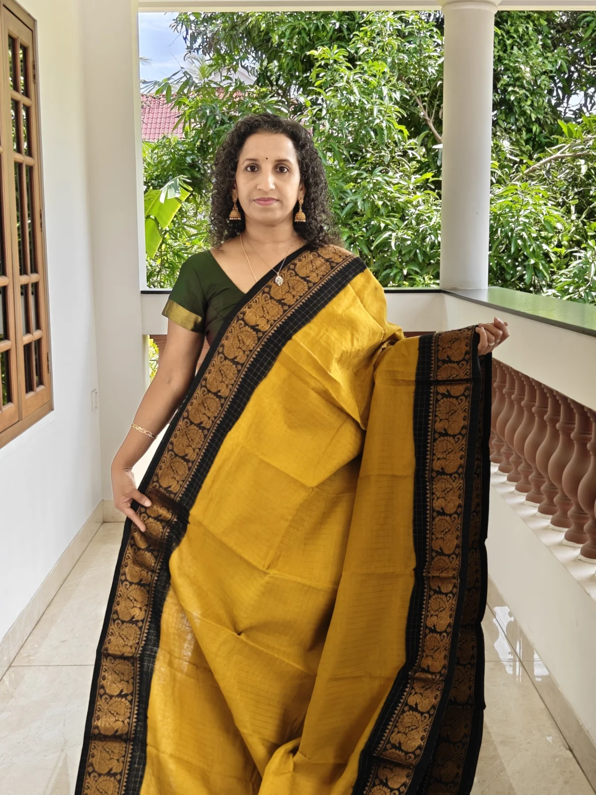 Mustard Yellow and Black Sungudi Cotton Saree with Zari Kattam and Peacock Border 